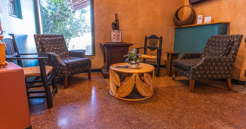 Cozy seating area with a circular woven coffee table