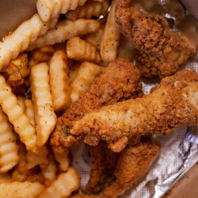 Catfish nuggets served with crinkle fries.