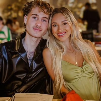 A couple posing for a picture.