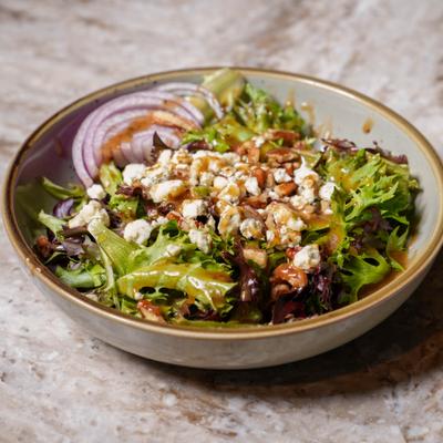 Aaaall Aboard Salad with candied pecans, goat cheese, cranberries and red onion.