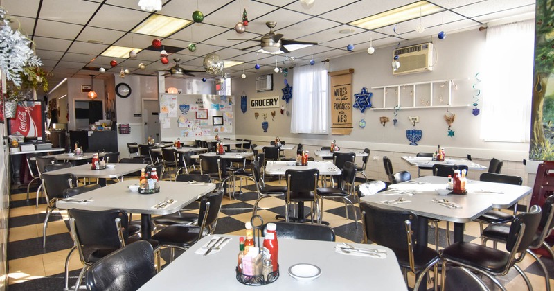 Interior, dining area, Christmas decorations hanging from the ceiling