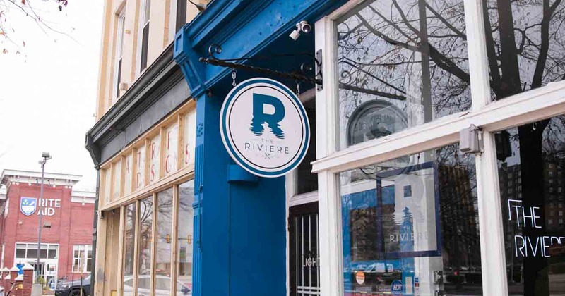 Exterior, front view, of restaurant, sign