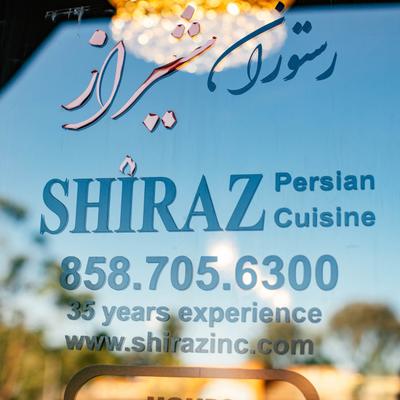 Restaurant contact information on the window.