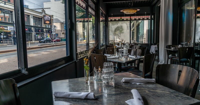 Interior, dining tables by a window side