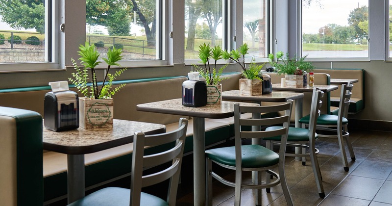 Interior, seating area with tables and chairs