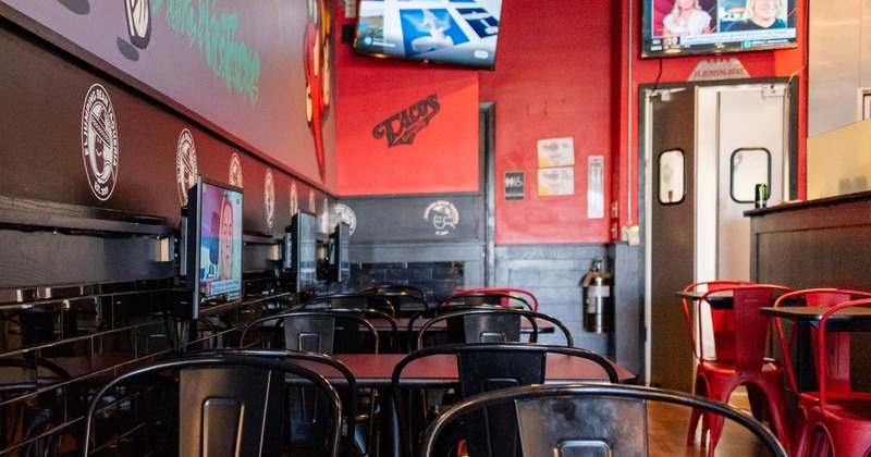 Interior seating area with tables and chairs