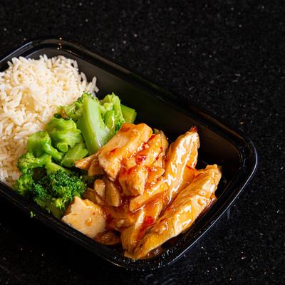 Sliced meat, rice and vegetables