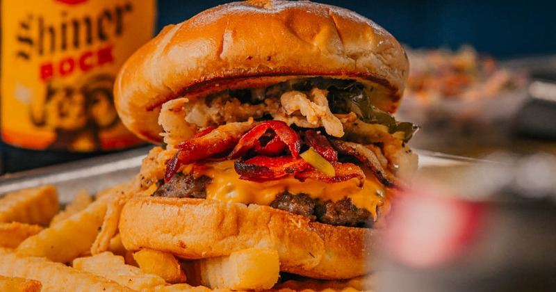 BBQ meat platter and a tray with side dishes, top view