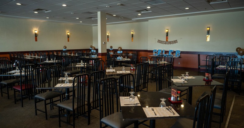 Interior, seating area with tables and chairs