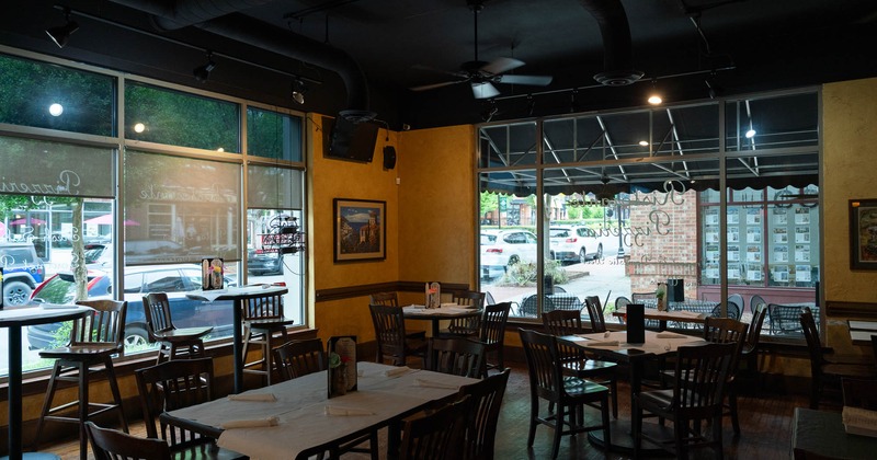 Interior, tables and chairs in dining area