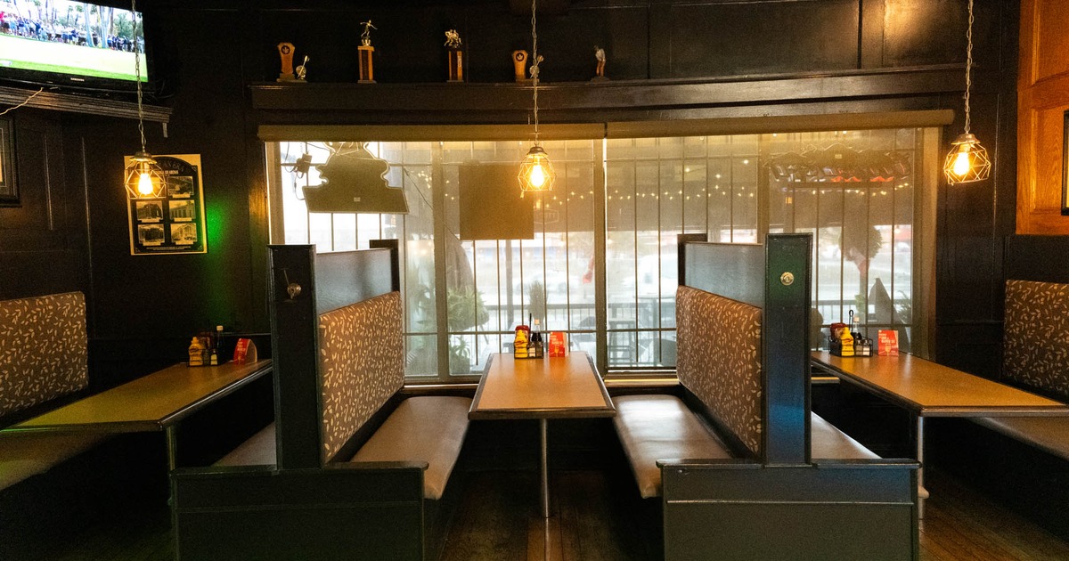 Interior seating area with tables and booths
