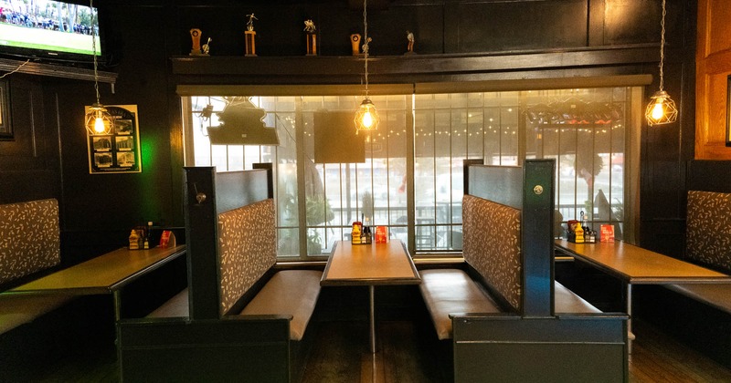 Interior seating area with tables and booths