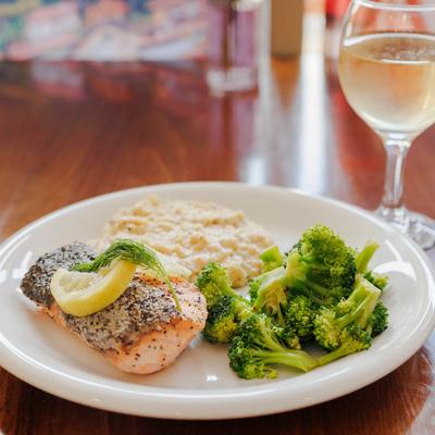 Blackened salmon with grits.