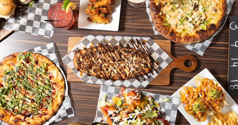 An assortment of dishes spread on a table, top view