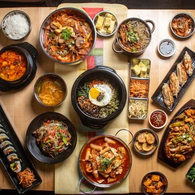 Variety of menu items served on the table, top view.