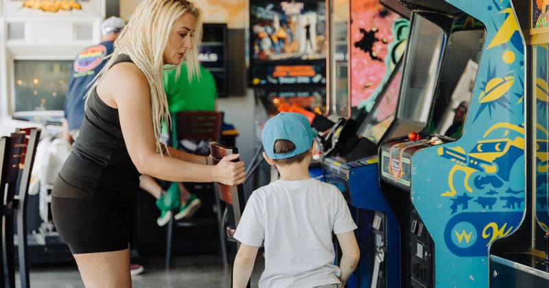 Interior, video game console, game room, customers playing