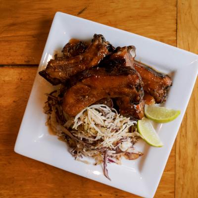 Marinated ribs served with coleslaw.