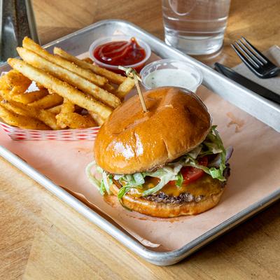Amarillo burger served with fries and dipping.