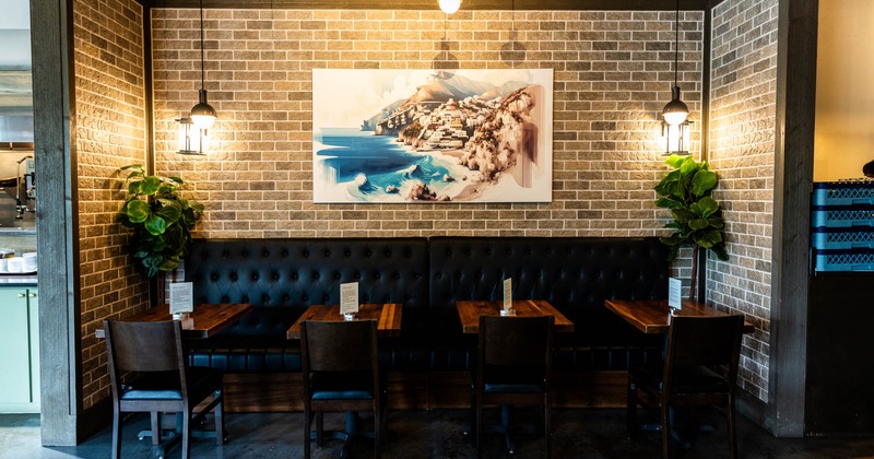 Interior, banquette seating with tables and chairs