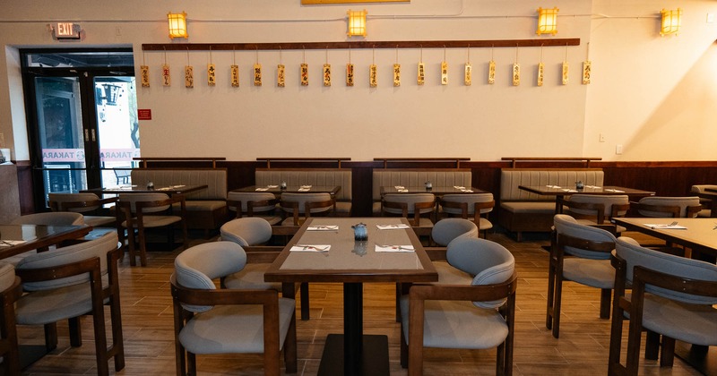 Interior, tables and chairs in dining area