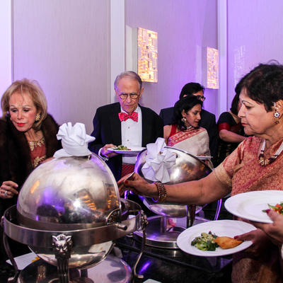 Crowd around the catering table