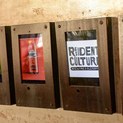 Assorted pictures in display cases