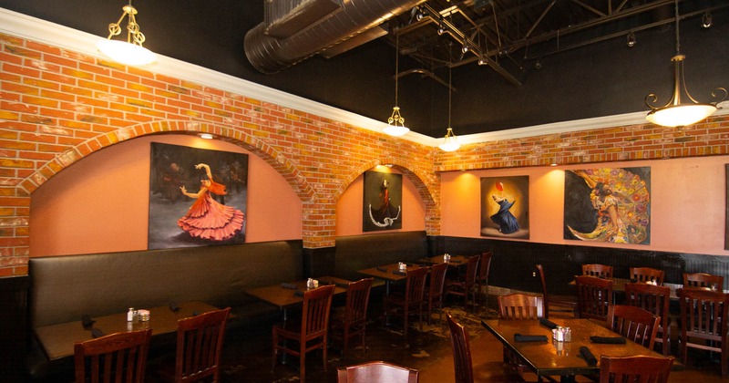 Interior, spacious seating area with tables and chairs