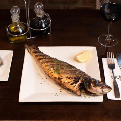 Grilled whole fish and red wine.
