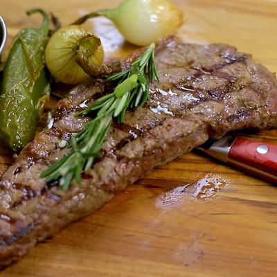 Grilled steak, with roasted peppers, onions, and rosemary.