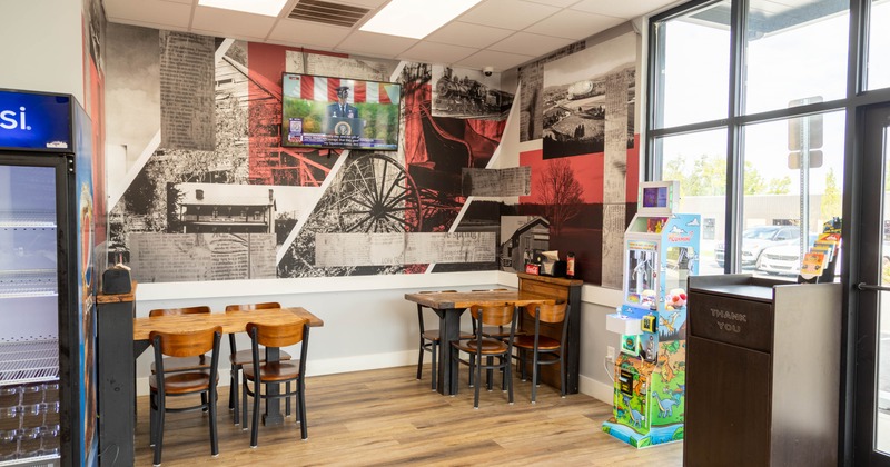 Dining space with TV on the wall