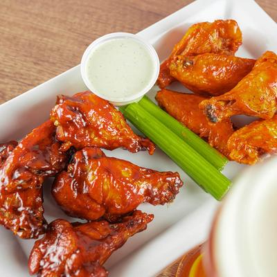 Traditional Wings served with celery and a dipping sauce.