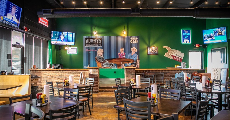 Pub interior, seating area, dining tables