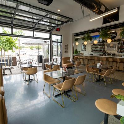 Seating tables and a bar.