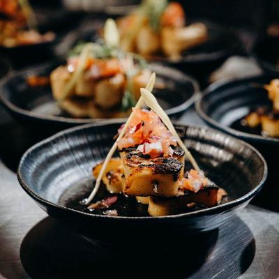 A close-up of grilled scallops.