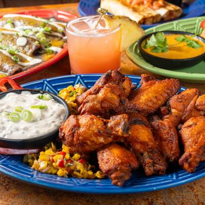 Assorted food and drinks on the table.