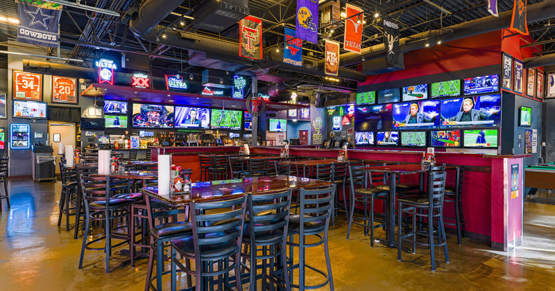 Interior, dining area, TVs all around the place
