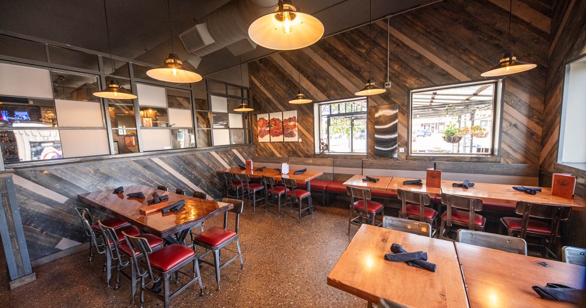 Restaurant interior, set dining tables ready to receive guests