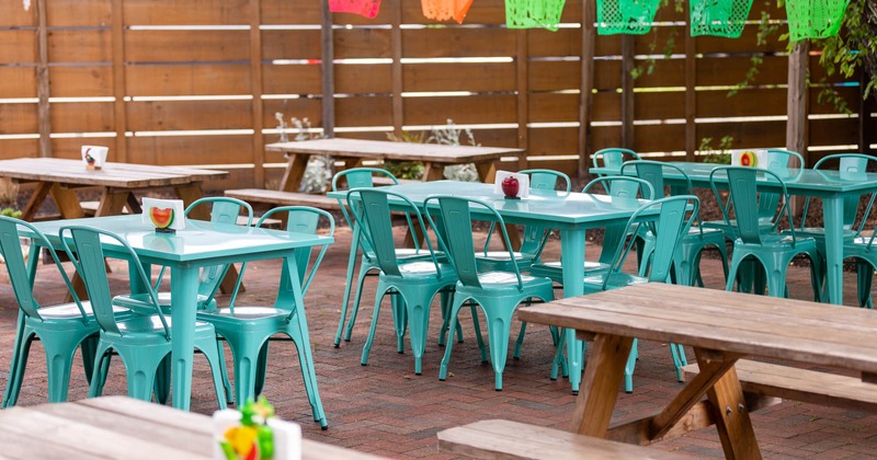Exterior, tables with chairs and benches