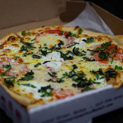 Margherita pizza in a box.