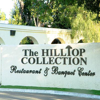 The Hilltop Collection wall sign.