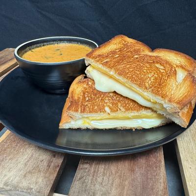 Triple Grilled cheese with tomato bisque soup.