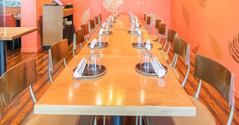 Private dining room room, table set for fourteen guests