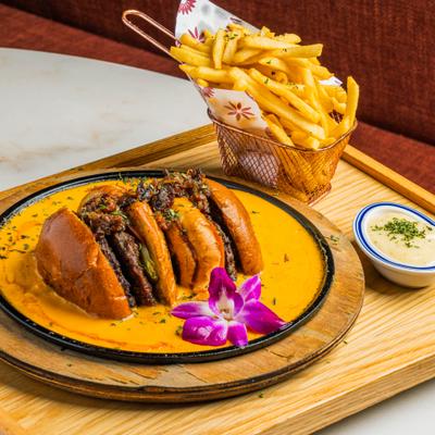 Cheese Lava Burger with fries.