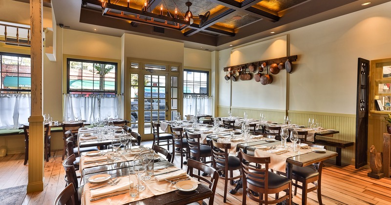 Restaurant interior, dining room with set tables