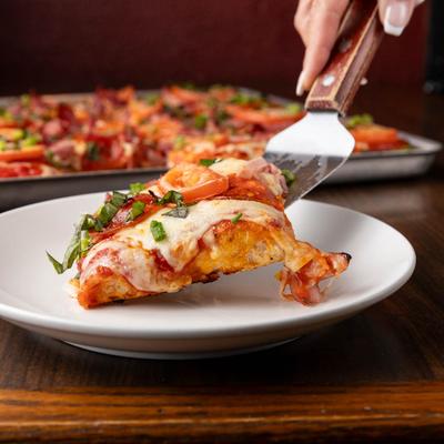 A slice of Sicilian pizza.