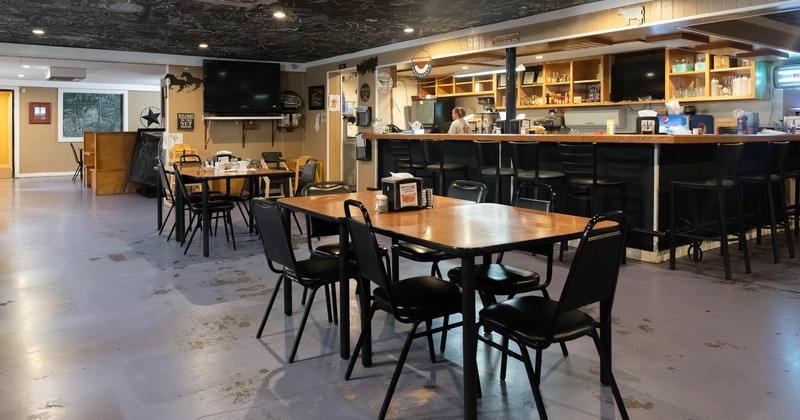 Interior, dining area with tables and chairs
