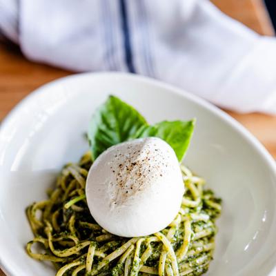 Served Pesto burrata, closeup.