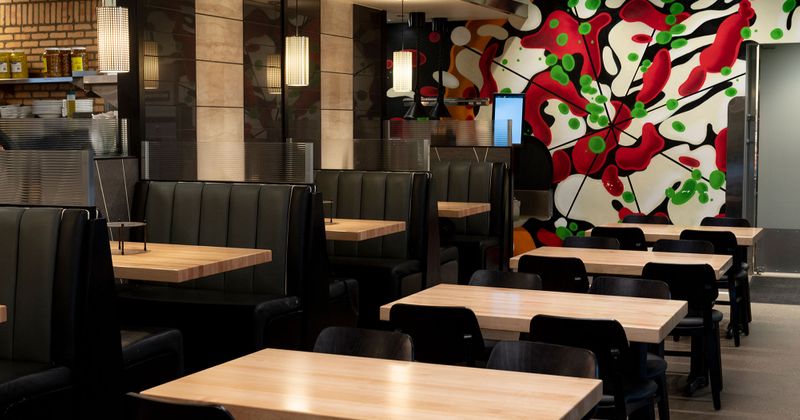 Interior, mural of pizza on wall