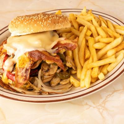 Bacon and Mushroom Cheeseburger with a side of French Fries.