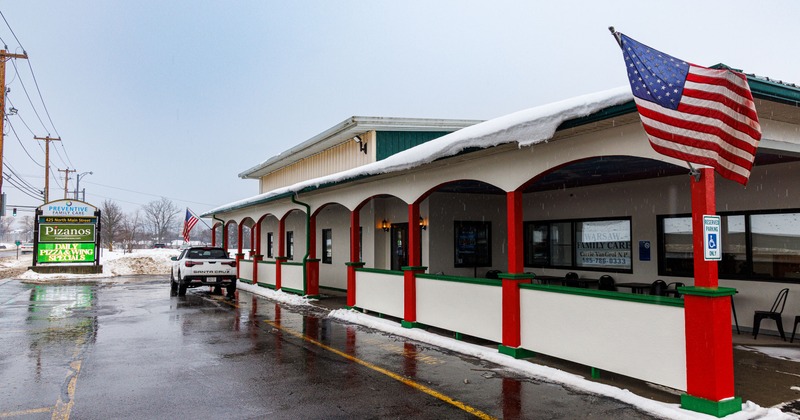 Exterior, front view to restaurant, parking lot